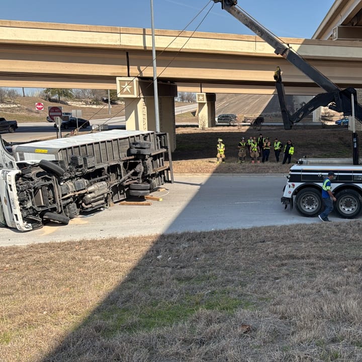 Rescue overturned truck on an Austin Highway.